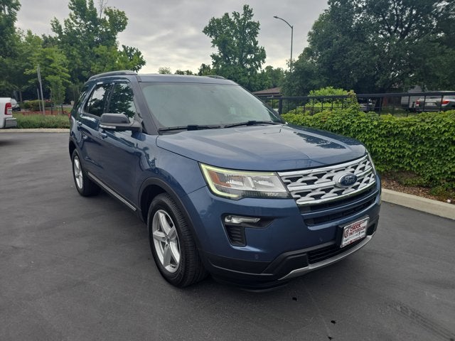 2018 Ford Explorer XLT in Blue Metallic — front three-quarter view