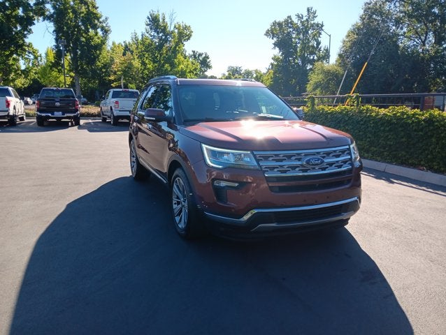 2018 Ford Explorer Limited in Cinnamon Glaze Metallic — front three-quarter view