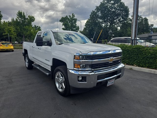 2015 Chevrolet Silverado 2500HD LTZ in Summit White — front three-quarter view
