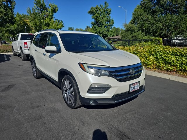 2017 Honda Pilot Elite in White Diamond Pearl — front three-quarter view