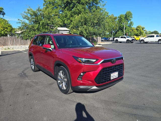 2024 Toyota Grand Highlander Limited in Red — front three-quarter view