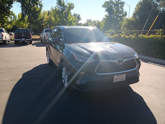 2023 Toyota Highlander Limited in Midnight Black Metallic — front three-quarter view