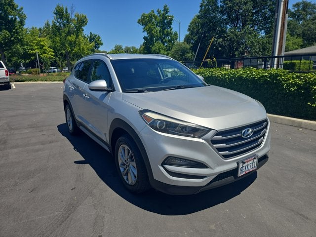 2018 Hyundai Tucson SEL in Molten Silver — front three-quarter view